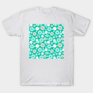 Small blue, white and pink flowers over a turquoise background T-Shirt